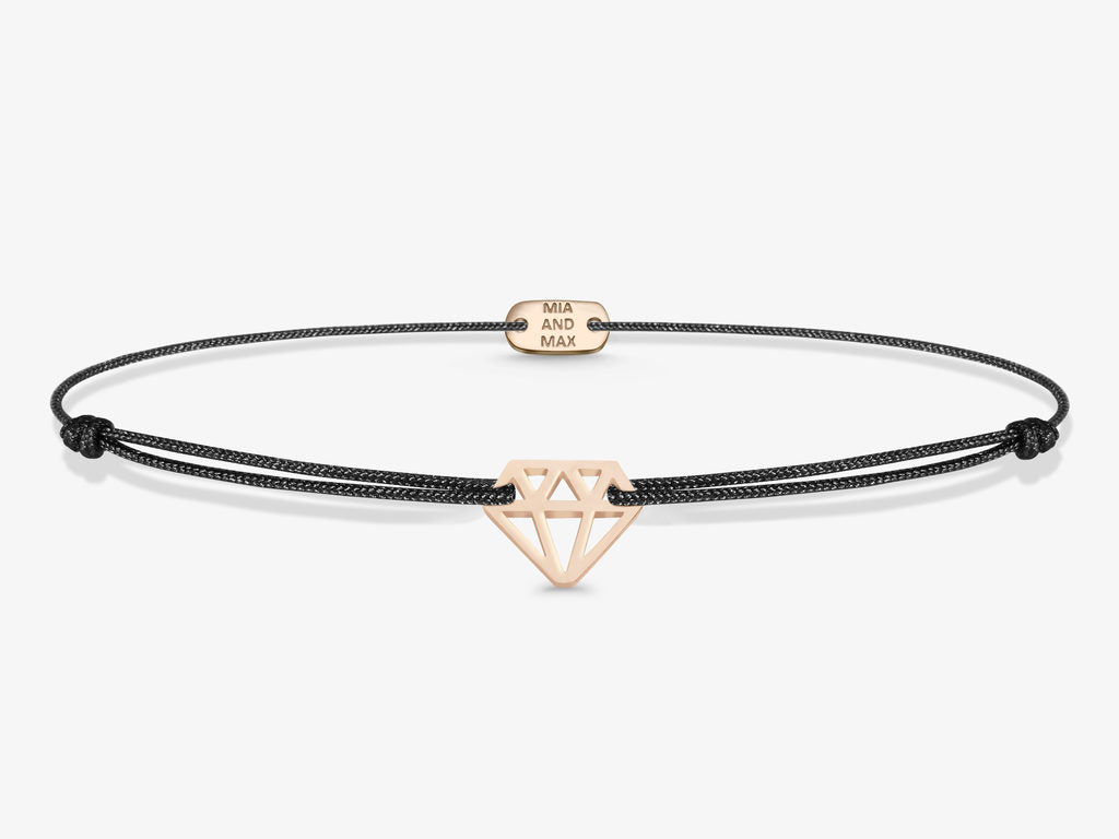 The diamond bracelet features a cute diamond shaped sterling silver pendant and strong textile cord. It comes in rose gold or silver color.